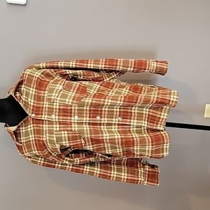 VINTAGE WOOLRICH wool button down. Men's size L . Rust/tan plaid